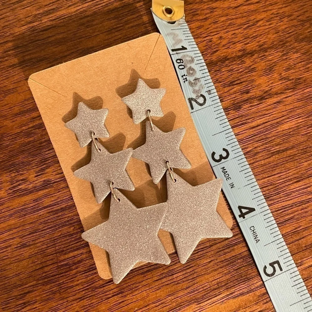 N/A star earrings
